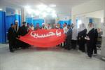 دیدارروحانیون با پرسنل بیمارستان وچرخاندن پرچم بارگاه سید الشهدا بین پرسنل